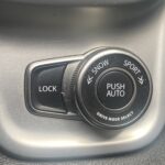 Fahrzeugbedienelement mit Drive Mode Select: Snow, Sport und Push Auto sowie Lock-Taste für Allradsteuerung.